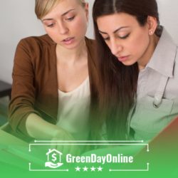 Two women looking at Columbus payday loans data on a computer screen